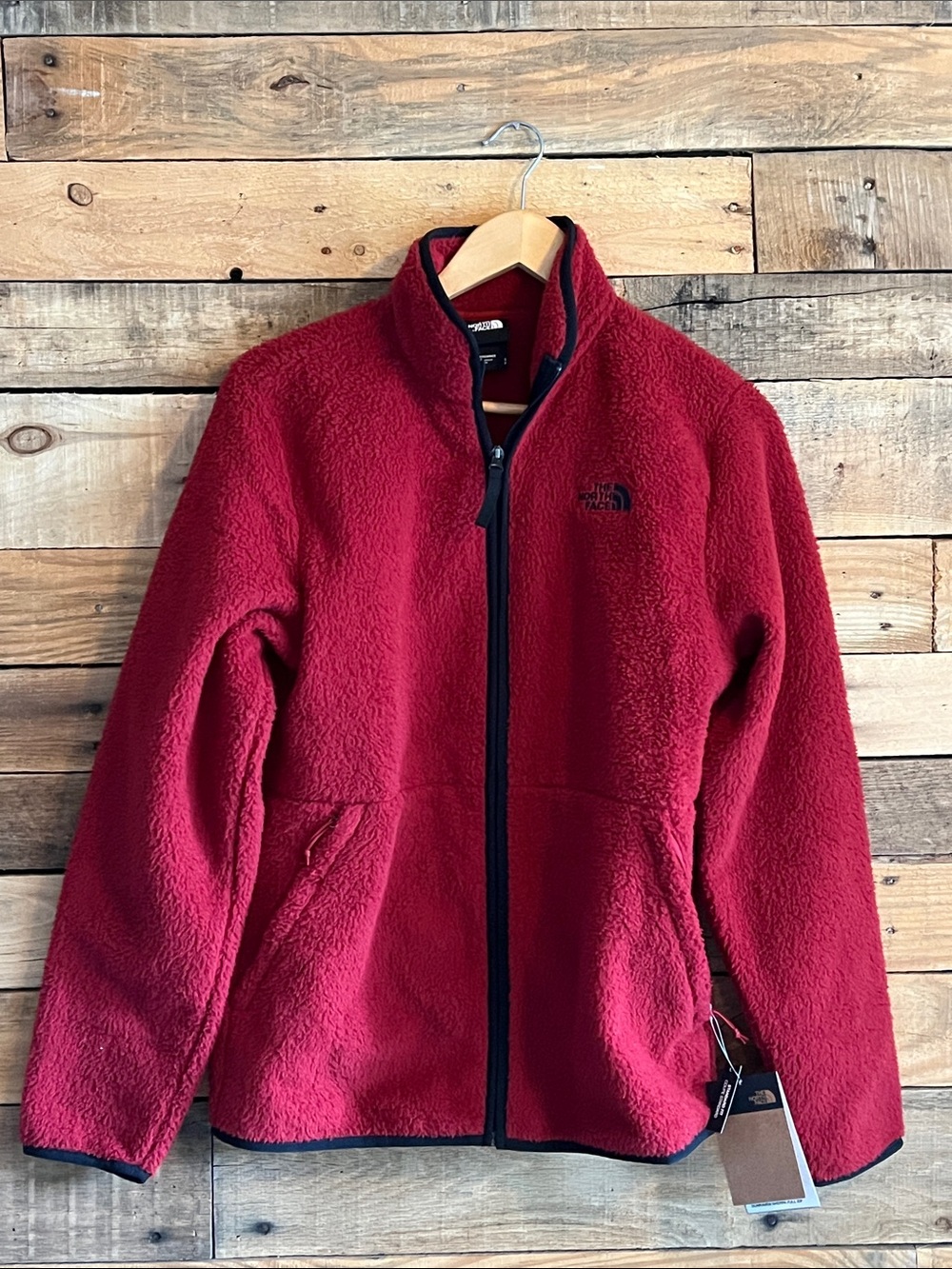 The North Face Deep Red Sherpa Fleece Jacket with Black Trim